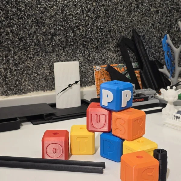 A set of vibrant 3D printed alphabet blocks from Print3D.pk for learning and play.