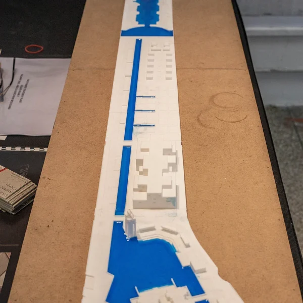 Detailed white and blue 3D printed urban landscape model by Print3D.pk.