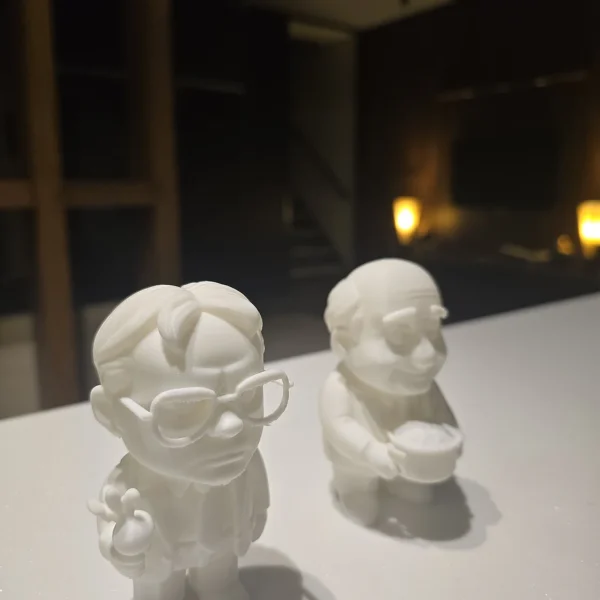 Adorable 3D printed couple figurines with intricate details, exclusively available at Print3D.pk.