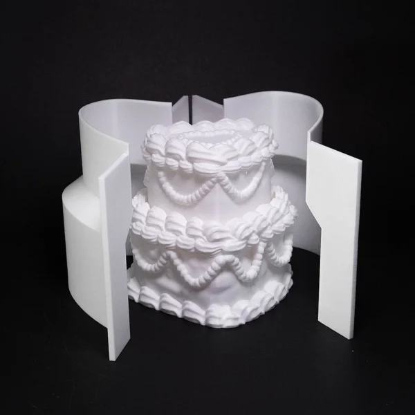 Beautiful 3D printed white wedding cake model with intricate designs by Print3D.pk. - View 2