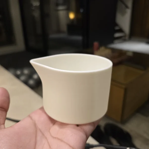 Beautiful 3D printed white measuring cup available at Print3D.pk for your daily needs.