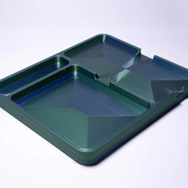 A 3D printed desk organizer tray with multiple compartments from Print3D.pk for office supplies.