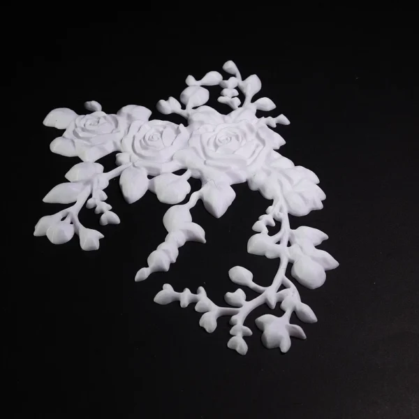 Beautiful 3D printed white rose decoration with leaves from Print3D.pk for home decor.