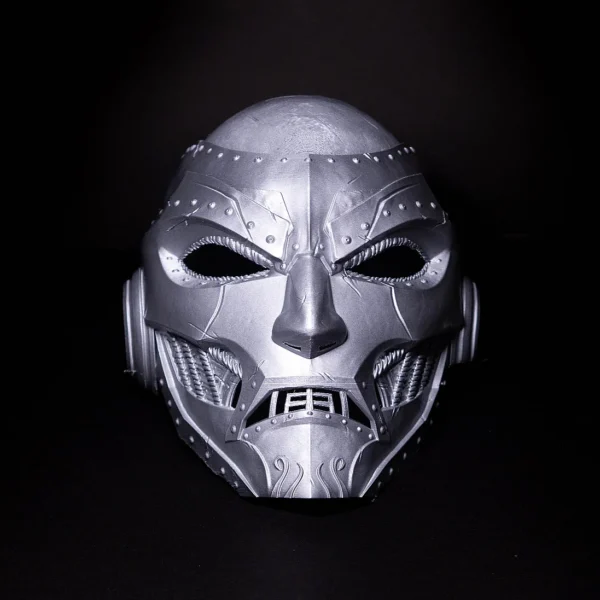 A futuristic cyberpunk metal face mask with intricate design by Print3D.pk for cosplay and collectors.