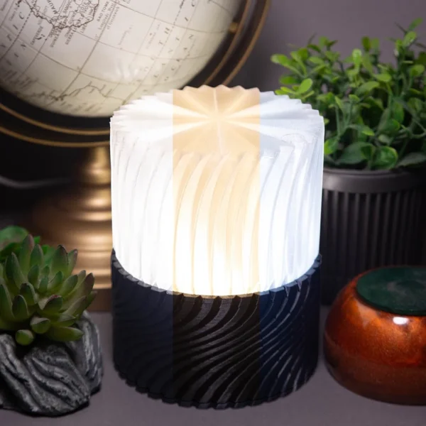 A 3D printed table lamp with unique design available at Print3D.pk for home decor.