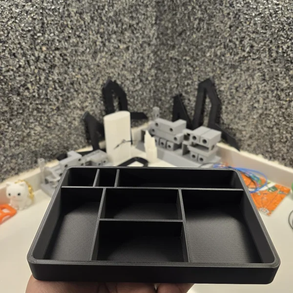 A 3D printed desk organizer tray with compartments, proudly offered by Print3D.pk for organized workspace solutions.