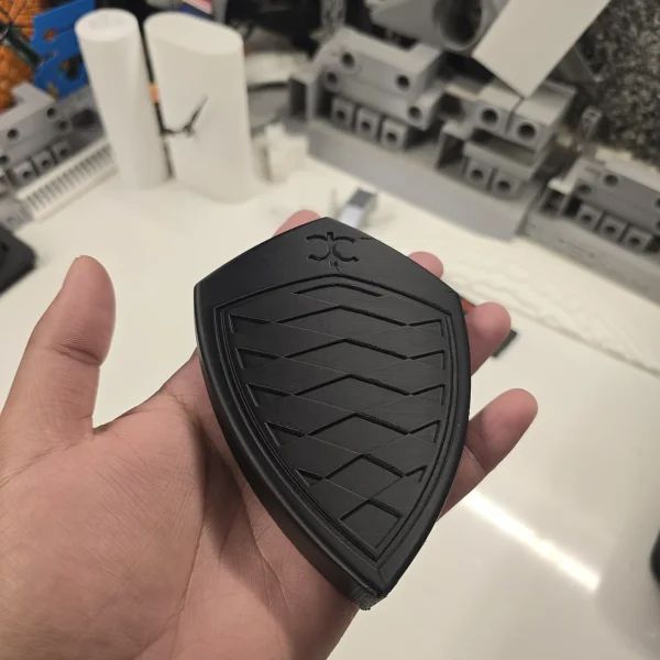 Custom 3D printed black gaming mousepad with unique design from Print3D.pk for smooth gaming experience.