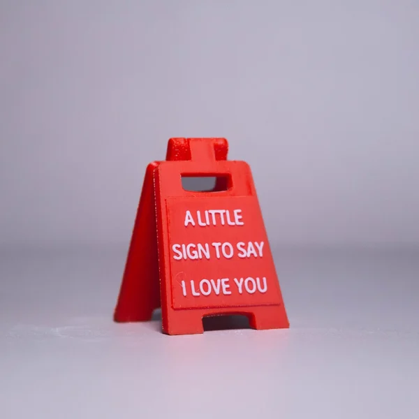 A charming 3D printed love sign from Print3D.pk, perfect for expressing affection creatively always.