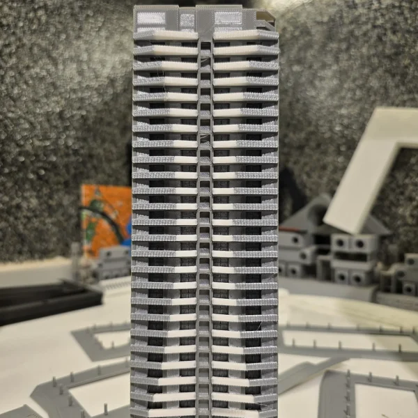 A highly detailed 3D printed skyscraper model by Print3D.pk showcasing intricate architectural design.