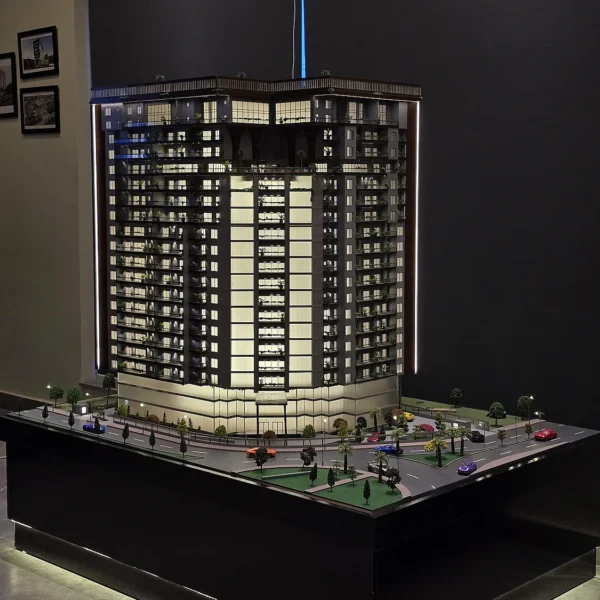 Detailed 3D printed high-rise architectural model with landscaping and miniature cars by Print3D.pk. - View 2